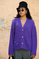 La Granni purple knitted cardigan for women, lightweight and cozy, shown in XS size with front buttons and long sleeves.