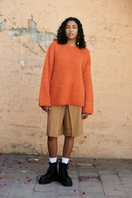 Orange La Granni SURI knitted crewneck sweater, close-up of textured fabric and ribbed collar in XS size.
