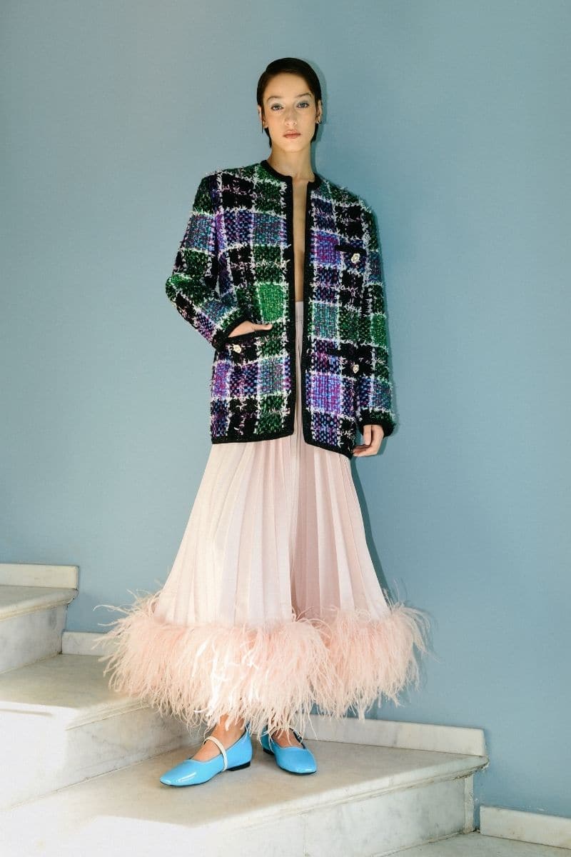Baby pink cotton maxi skirt with feather trim from Lalo, featuring a flowing design and soft fabric for a stylish, comfortable look.