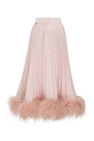 Baby pink cotton maxi skirt with feather trim from Lalo, featuring a flowy design and soft fabric suitable for young children.