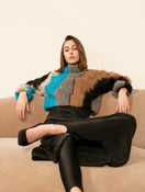 Lalo cropped wool sweater in soft knit fabric, featuring a fitted silhouette and ribbed cuffs, styled on a model.