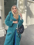 Teal CULT MIA X LALO pearl-embroidered mohair coat, showcasing intricate embroidery and luxurious texture in a stylish design.