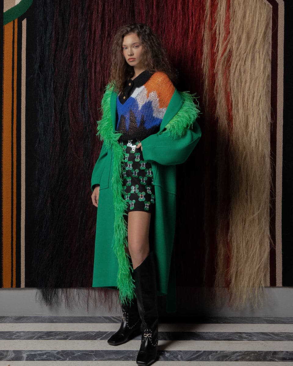 Lalo feather-detailed green belted wool coat, front view showing tailored design and feather embellishments.