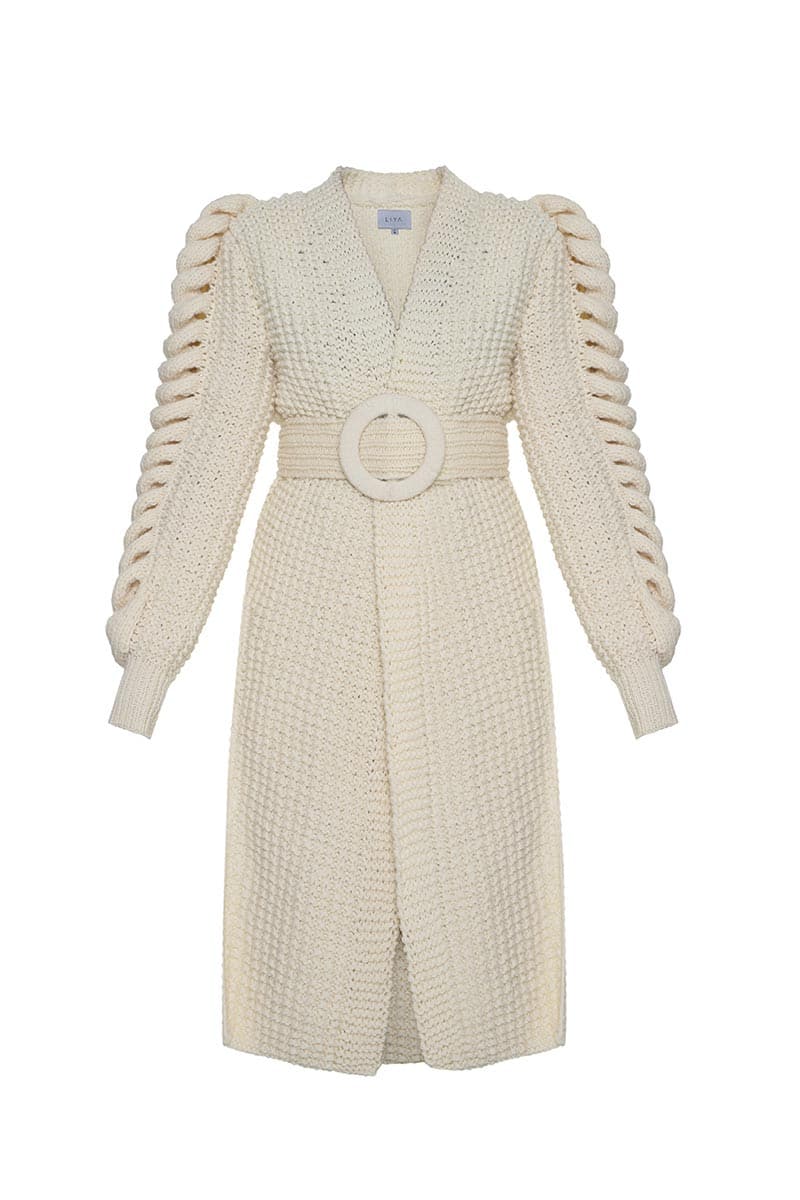 White belted Liya cardigan with knit sleeves, featuring a stylish button-up front and a cozy, casual fit.