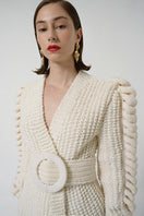 Liya belted cardigan with knit sleeves in white, featuring a waist belt and cozy knit detailing, stylish and comfortable for everyday wear.