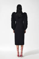 Black Liya statement sleeves cardigan featuring bold, ruffled sleeves and a cozy fit, perfect for stylish layered looks.