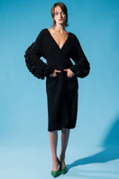Black Liya statement sleeves cardigan featuring bold, stylish sleeves and a cozy knit design, ideal for modern fashion looks.