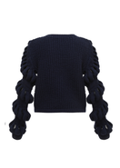 Hand-knitted wool-blend black sweater by Liya, featuring a cozy, textured knit pattern and a classic fit.