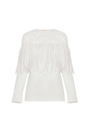 White knitted sweater with fringes by Liya, featuring cozy, textured knit and stylish fringe details.