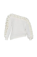 White Liya off-shoulder knit sweater displayed on a model, showcasing its relaxed fit and stylish neckline.