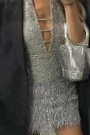Silver Monika Dimova Amina sparkling mini dress with a fitted silhouette, perfect for stylish evening wear.