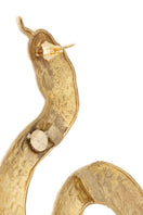 Gold-plated snake-shaped earrings from Natia x Lako featuring bold, curved design and shiny finish.