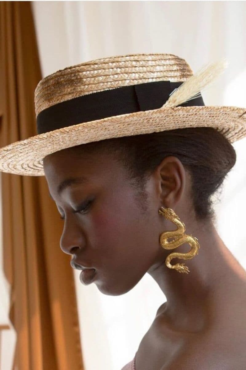 Gold-plated dragon-shaped earrings from Natia x Lako, small and stylish jewelry with intricate detailing.
