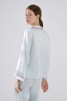 Not Just Pajama midsummer afternoon long pajama set, soft fabric with floral print, featuring a button-up top and matching pants.