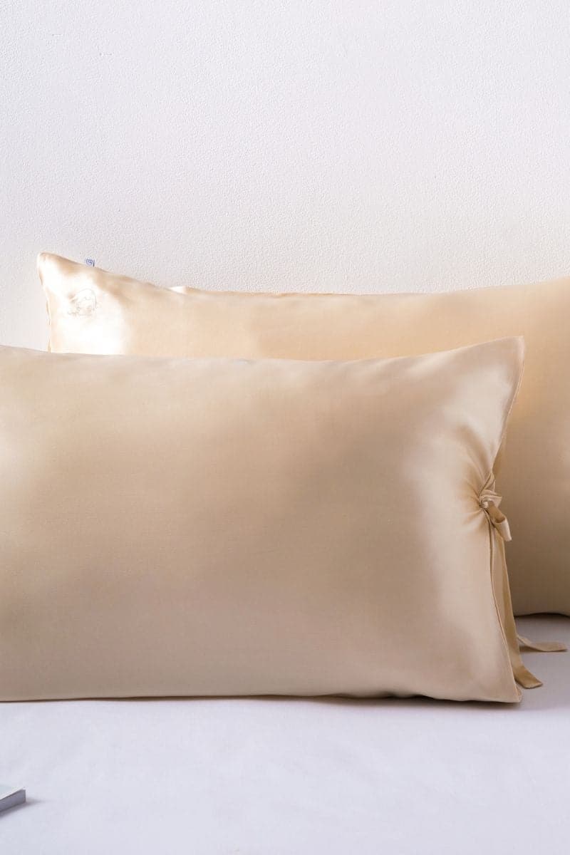 Classic queen-size silk pillowcase by Not Just Pajama in champagne color, soft and smooth fabric for luxurious sleep comfort.