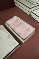 Queen-size silk pillowcase in rose pink by Not Just Pajama, soft and smooth fabric for luxurious sleep comfort.