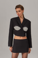 Nué cropped tailored blazer in EU size 38, featuring a structured fit and classic design, ideal for professional or casual wear.