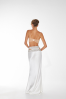Nué Lotus Crystal Bralette tops featuring delicate crystal details and soft fabric, displayed on a neutral background.
