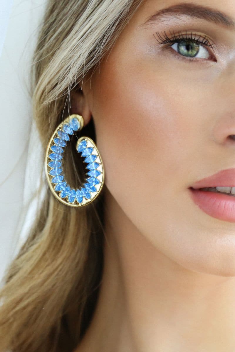 Blue Santa Fe earrings by Sara Shala featuring vibrant, handcrafted jewelry with intricate design details.