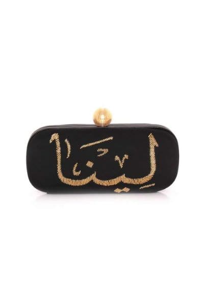 Sarah's Bag customized black clutch with gold calligraphy design, featuring a sleek rectangular shape and elegant finish.