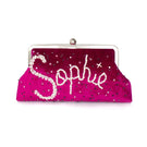 Customized fuchsia velvet clutch by Sarah's Bag, stylish evening bag with elegant texture and compact design.