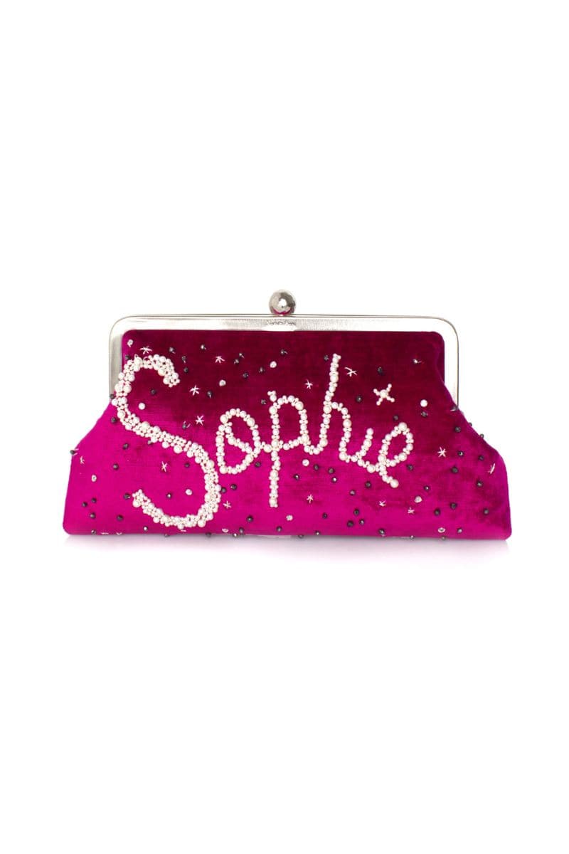 Customized fuchsia velvet clutch by Sarah's Bag, stylish evening bag with elegant texture and compact design.