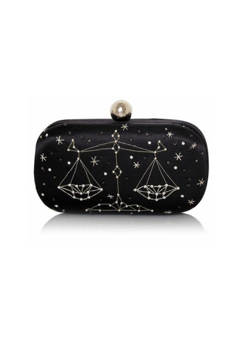 Black personalized Astro Box clutch by Sarah's Bag featuring Aries zodiac symbol and celestial design.