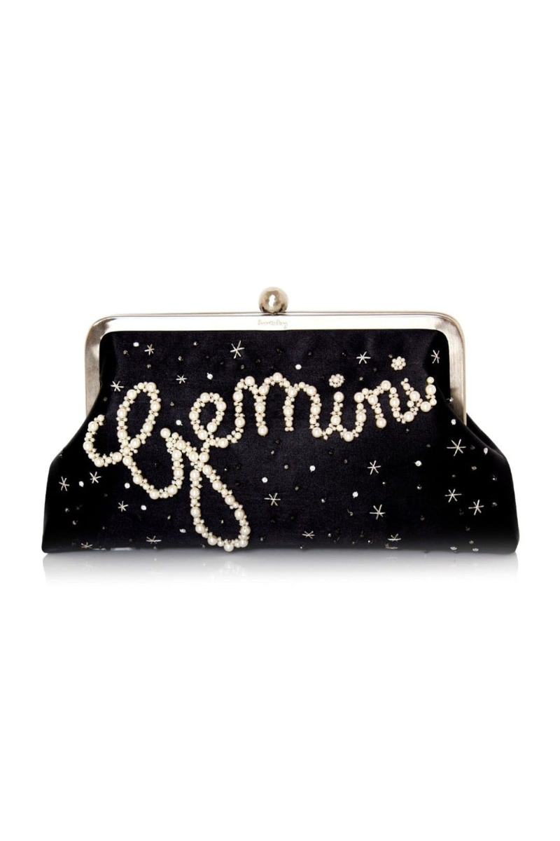 Black personalized Astro clutch by Sarah's Bag with Aries zodiac design, featuring a sleek, compact style perfect for evening events.
