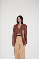 Brown Verheyen CHESCA oversized leather blazer shown on a model, featuring a relaxed fit and classic lapel design.