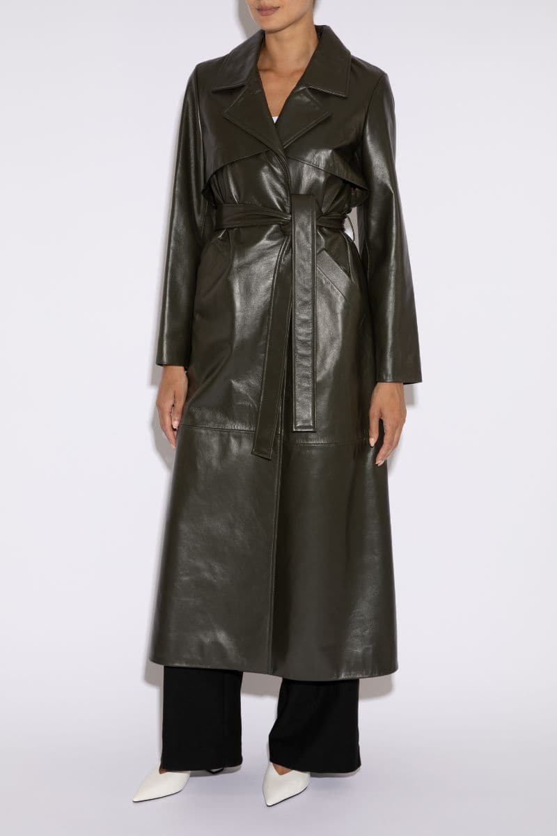 Dark khaki leather trench coat by Verheyen, featuring a tailored fit and classic design, shown on a model.